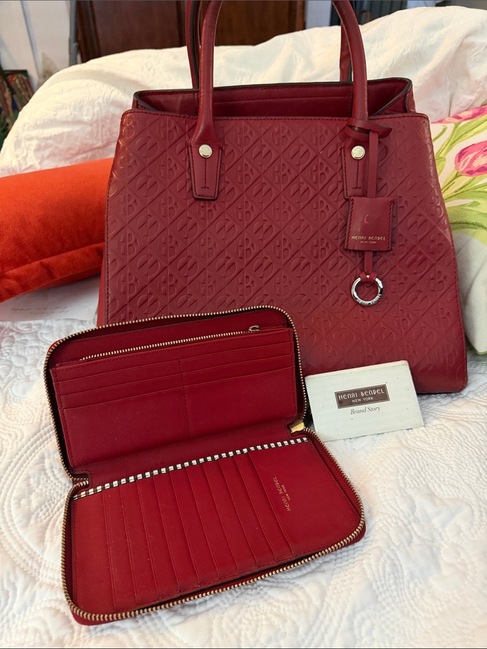 henri bendel embossed red leather tote with matching zip wallet